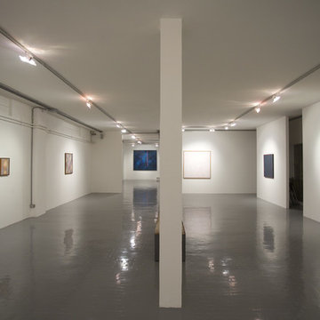 ristrutturazione di un vecchio garage convertito in galleria d'arte