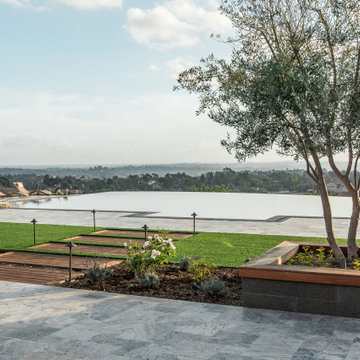 Gorgeous Infinity Pool with Multiple Outdoor Living Spaces