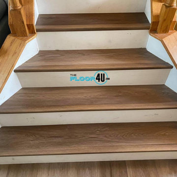 COREtec Pro Plus Enhanced HD in Buckingham Oak with white risers.