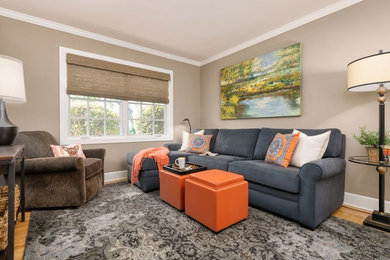 Example of a small transitional formal and enclosed light wood floor and beige floor living room design in San Francisco with gray walls, no fireplace and no tv