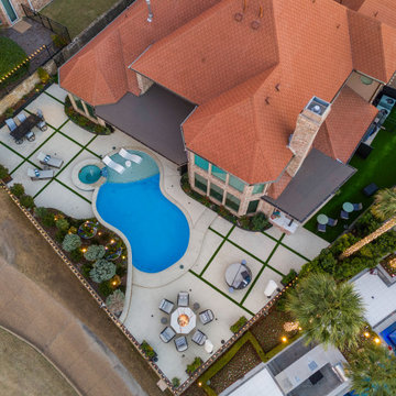 Custom Outdoor Living Pool Deck with Stamped Concrete & Turf
