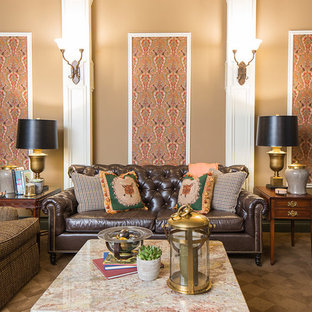 Inspiration for a large enclosed home cinema in Nashville with brown walls, carpet and a projector screen.