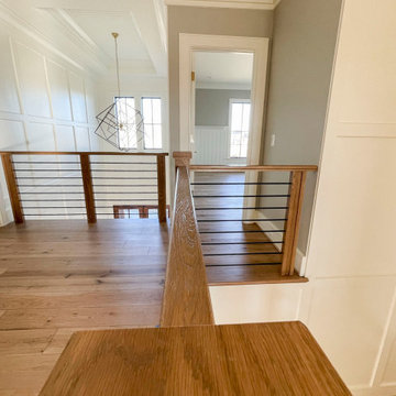 Project #101 | Elegant Staircase with Custom Carved Newels