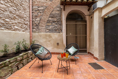 Esempio di un patio o portico contemporaneo