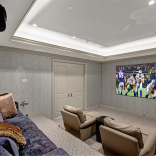 Home theater - traditional enclosed carpeted and beige floor home theater idea in Dallas with gray walls and a projector screen