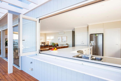 Inspiration for a beach style kitchen in Wollongong.
