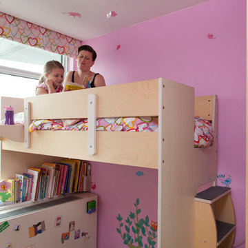 Boerum Hill; A small face is fitted with a loft bed and built-in cabinets
