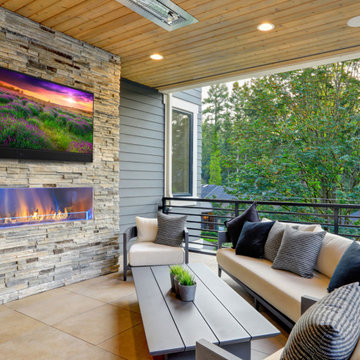 Covered Porch Featuring Seura Shade Series Outdoor TV