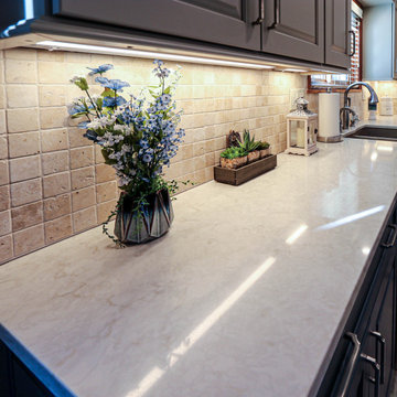 Two Tone Blue and Light Gray Kitchen with Tiled Island