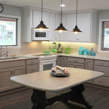 White Upper Cabinet and Gray Base Cabinet Kitchen With Quartz Counters