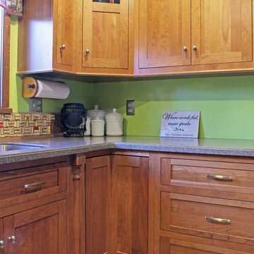 Medium Cherry Transitional Kitchen with Stove-top Peninsula