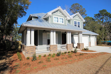 Example of an arts and crafts exterior home design in Miami