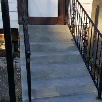 AFTER PHOTO concrete with wrought iron hand rails