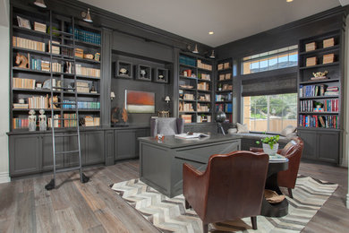 Example of a transitional home office design in Los Angeles