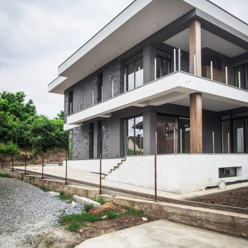 Modern two-story house with a terrace