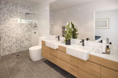 Large contemporary bathroom in Melbourne with flat-panel cabinets, brown cabinets, an alcove shower, a one-piece toilet, multi-coloured walls, a drop-in sink, engineered quartz benchtops, grey floor, an open shower and white benchtops.