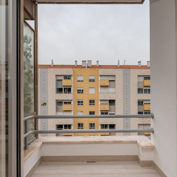 Balcony View Framed by Sliding Doors in Laranjeiras