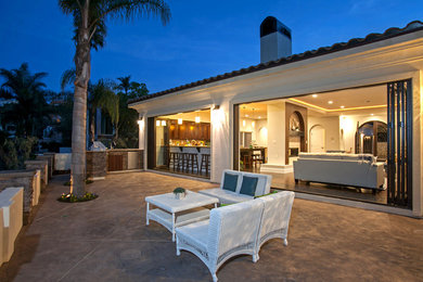 Design ideas for a large traditional backyard patio in Orange County with no cover.