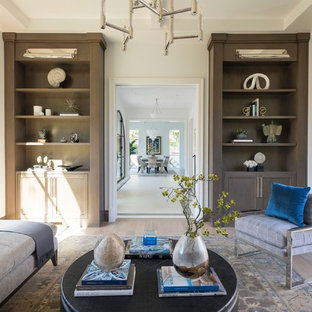 Inspiration for a mediterranean open plan living room in Dallas with a reading nook, white walls, light hardwood flooring, a standard fireplace and a stone fireplace surround.