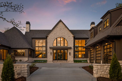 Example of a transitional exterior home design