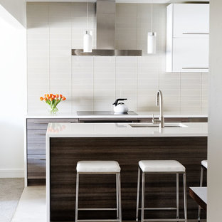 75 Beautiful Kitchen With Dark Wood Cabinets And Solid Surface