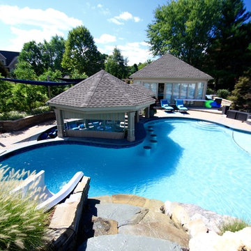 Custom Freeform Pool with Swim Up Bar and Waterslide