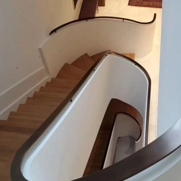 Knee Wall Railing with Custom Curved Stairs