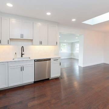 White Kitchen with Picket Backsplash