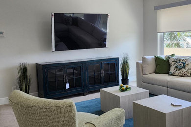 Family room - coastal family room idea in Miami