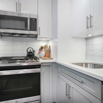 Grey Kitchen with Crystile Wave Backsplash