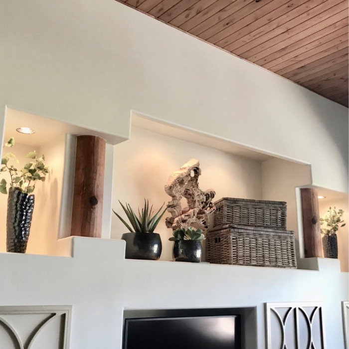 Mid-sized transitional enclosed porcelain tile and beige floor family room photo in Phoenix with beige walls and a tv stand