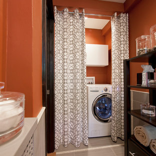 Design ideas for a contemporary utility room in Chicago with orange walls.