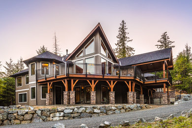 Large rustic beige two-story concrete fiberboard exterior home idea