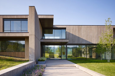 Contemporary beige two-story mixed siding exterior home idea in Denver