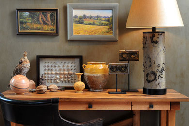 Inspiration for a mid-sized southwestern freestanding desk carpeted and gray floor study room remodel in New York with gray walls