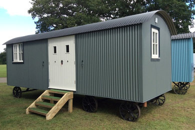 Inspiration for an expansive modern detached guesthouse in Other.