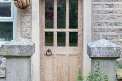 Photo of a farmhouse entrance in Gloucestershire.