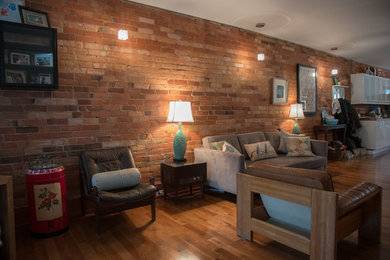 Inspiration for a rustic loft-style living room remodel in Toronto
