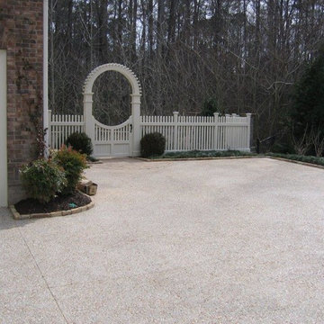 Cypress Arbor backyard entrance, Pea Gravel driveway and Stone Edging