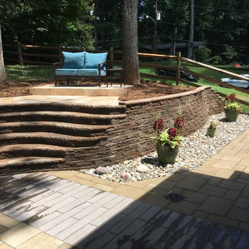 Multi-Level Paver Patio with Staircase and Seating