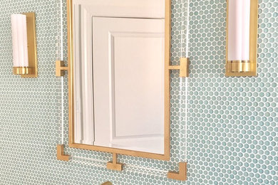 Example of a mid-sized trendy master bathroom design in New York with blue walls and solid surface countertops