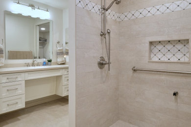 Inspiration for a mid-sized transitional master beige tile and ceramic tile ceramic tile, beige floor and single-sink bathroom remodel in Baltimore with shaker cabinets, white cabinets, a two-piece toilet, beige walls, an undermount sink, solid surface countertops, white countertops, a niche and a floating vanity