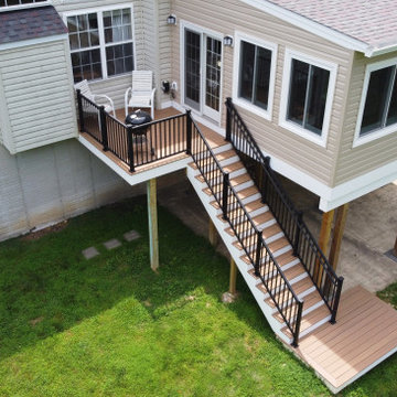 Sunroom Addition with Barnwood Feature Wall and TimberTech Antique Leather Deck