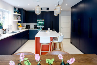 Large contemporary kitchen in Kent.