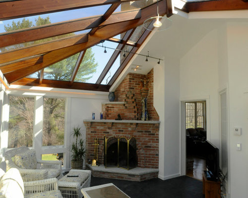 Moderner Wintergarten mit Kaminsims aus Backstein Ideen, Design