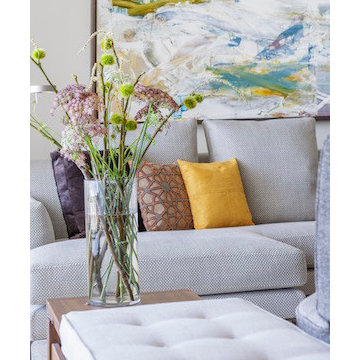Wild flowers balance the crisp lines of this modern living room
