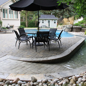 Wheelchair Accessible Pool Renovation with Waterfall and Slide