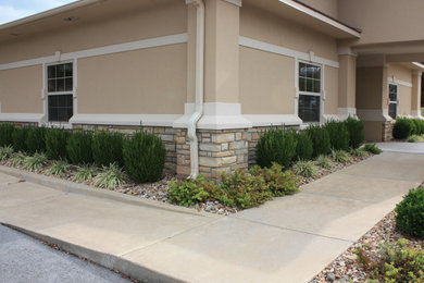 This is an example of an industrial exterior in Other with stone veneer.