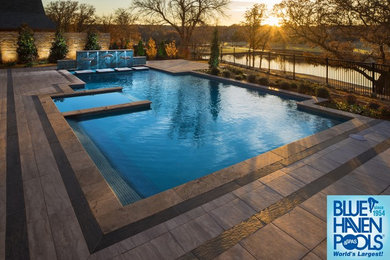 Inspiration for a large modern backyard rectangular pool remodel in Oklahoma City