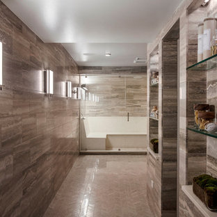 Photo of a contemporary fully buried basement in Philadelphia with grey walls, limestone flooring and no fireplace.